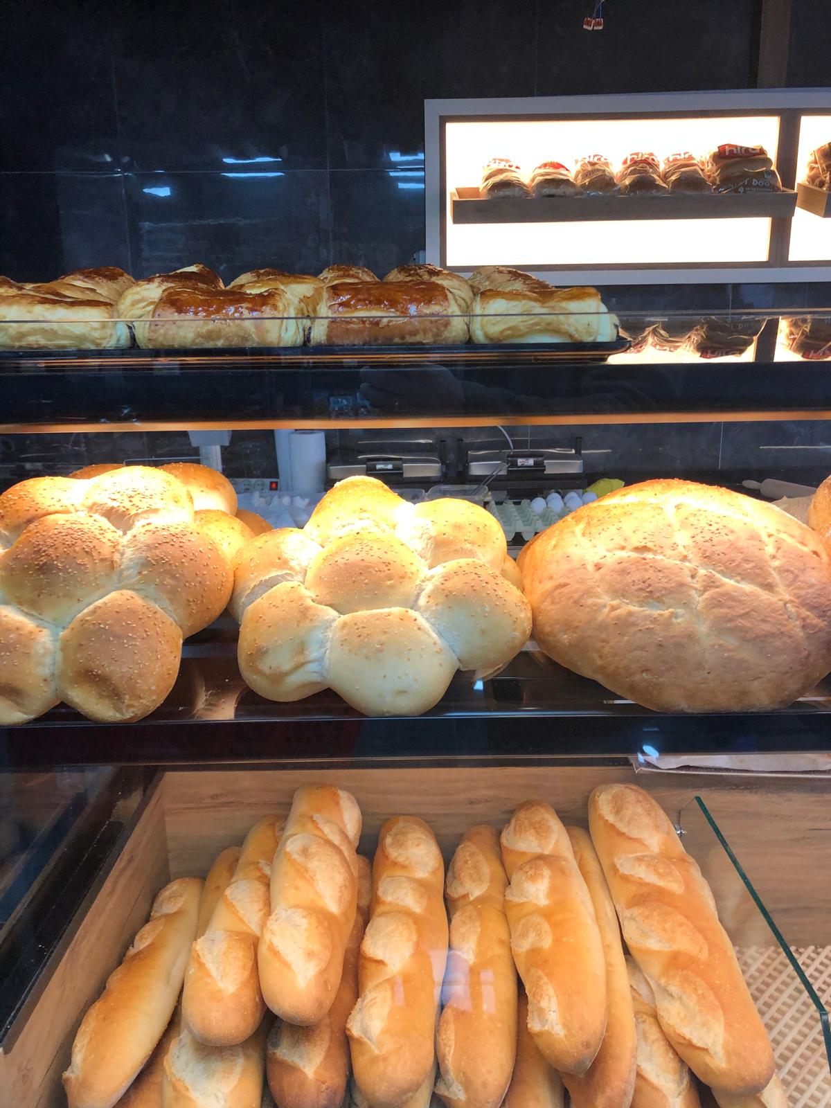Client au comptoir d'une boulangerie – illustration pack Boulangerie